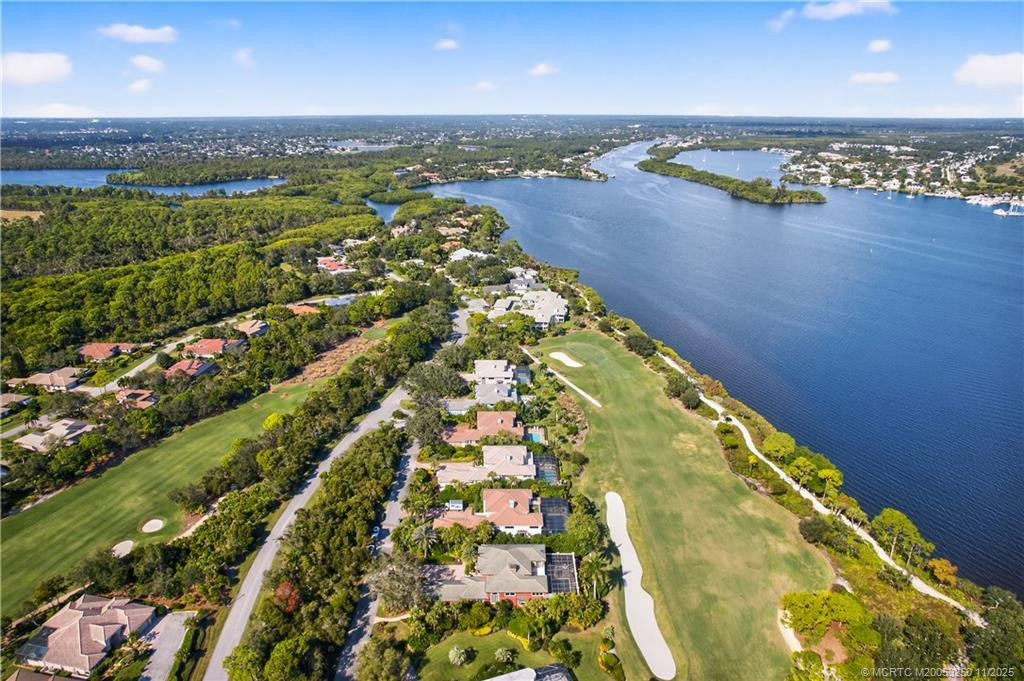 Exclusive Sand Pine Village in Harbour Ridge Y&CC overlooking Pete Dye #3 Fairway and St. Lucie River