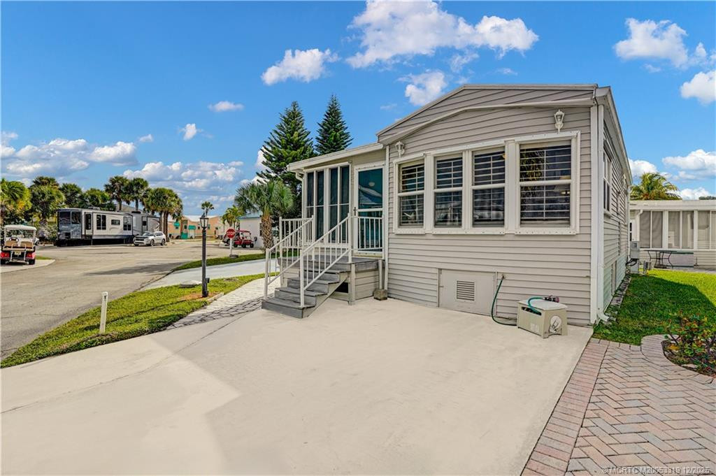 Photo 2 at 587 Nettles Boulevard, Jensen Beach