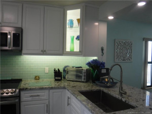 Lighted corner kitchen cabinet