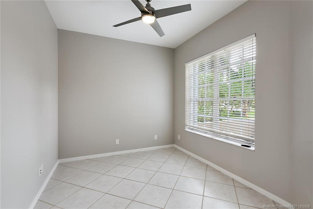 Den with new Ceiling Fan at 1741 SW Willowbend Lane, Palm City