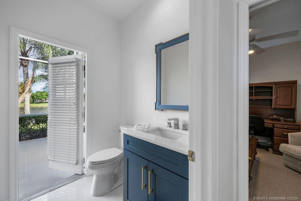 1/2 bath off of Kitchen for guests with entry to screened patio.