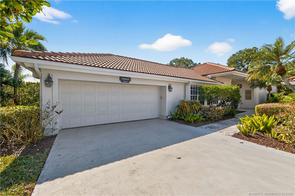 Front View of Home at 13017 Harbour Ridge Boulevard, Palm City