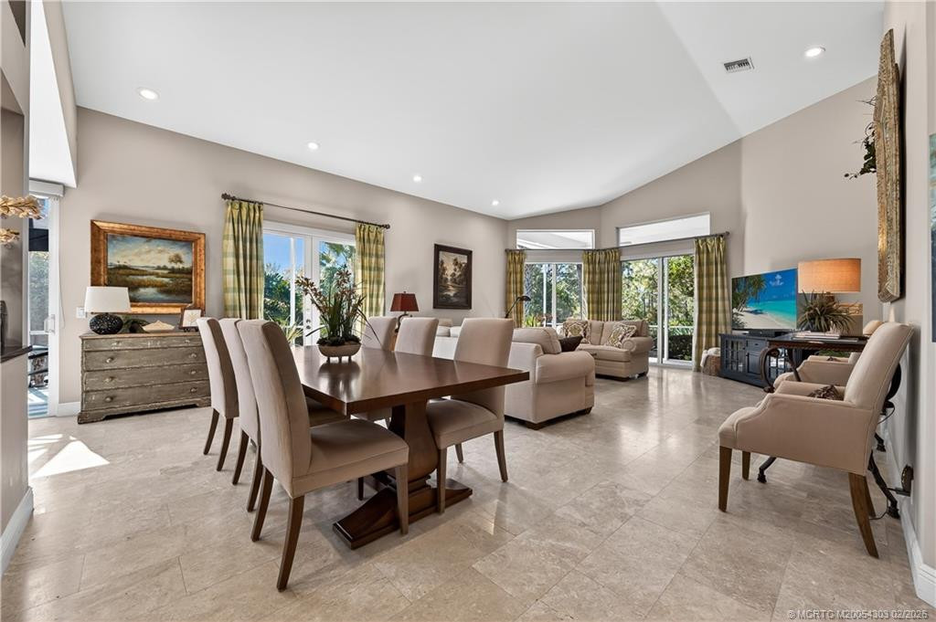 Open Living Room/Dining Area at 13017 Harbour Ridge Boulevard, Palm City