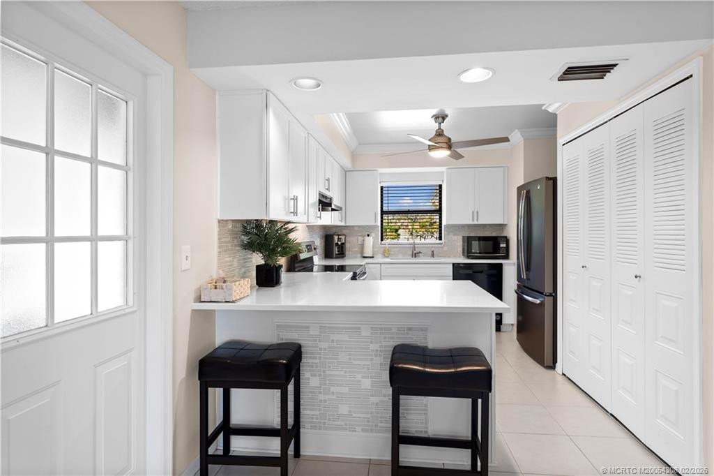 Light and bright, and fully updated! at 4885 SE Capstan Avenue 27, Stuart