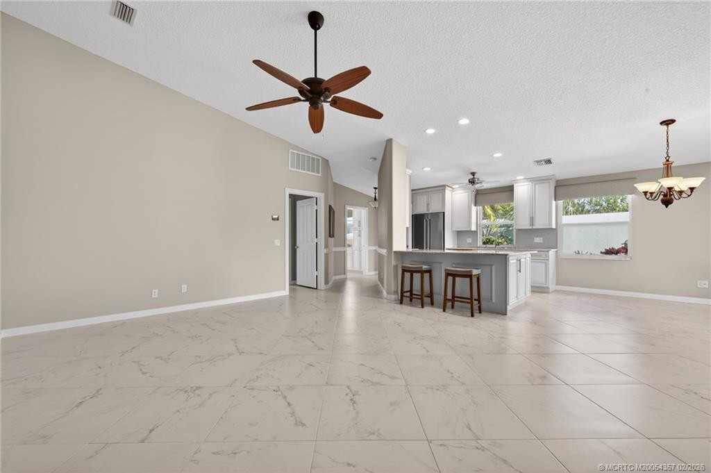 Quartz counter-tops and large eating bar