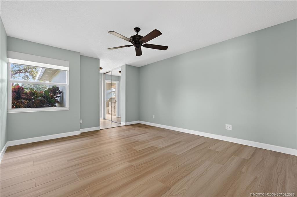Main bath features dual vanities, large walk-in shower and linen closet.