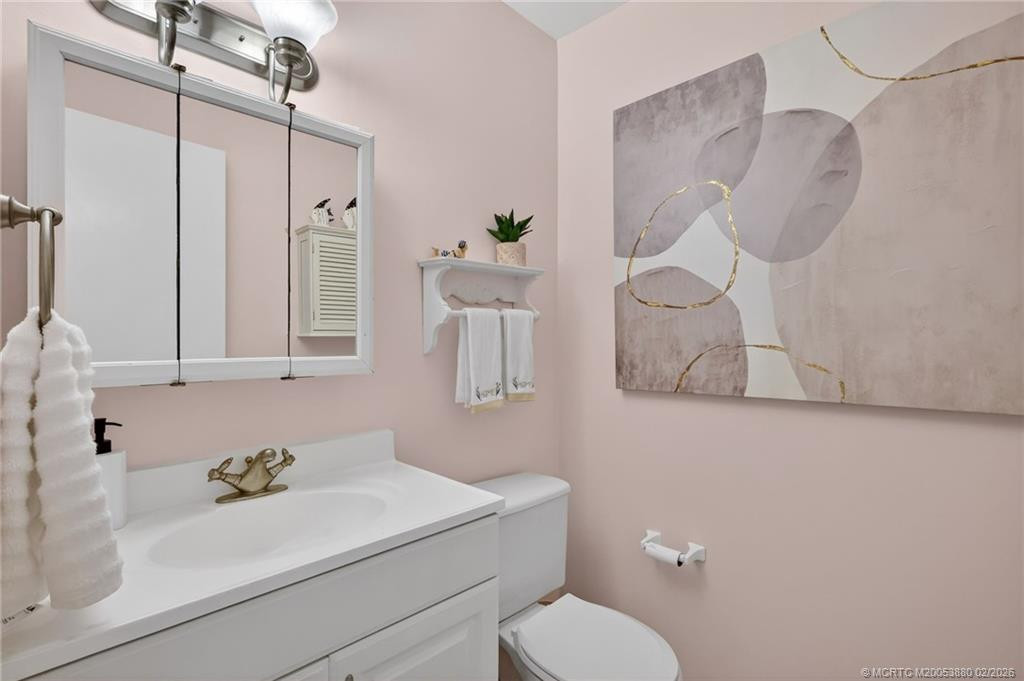 Convenient powder room in the hallway.