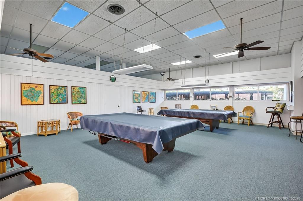 Two pool tables with many other games and activities.