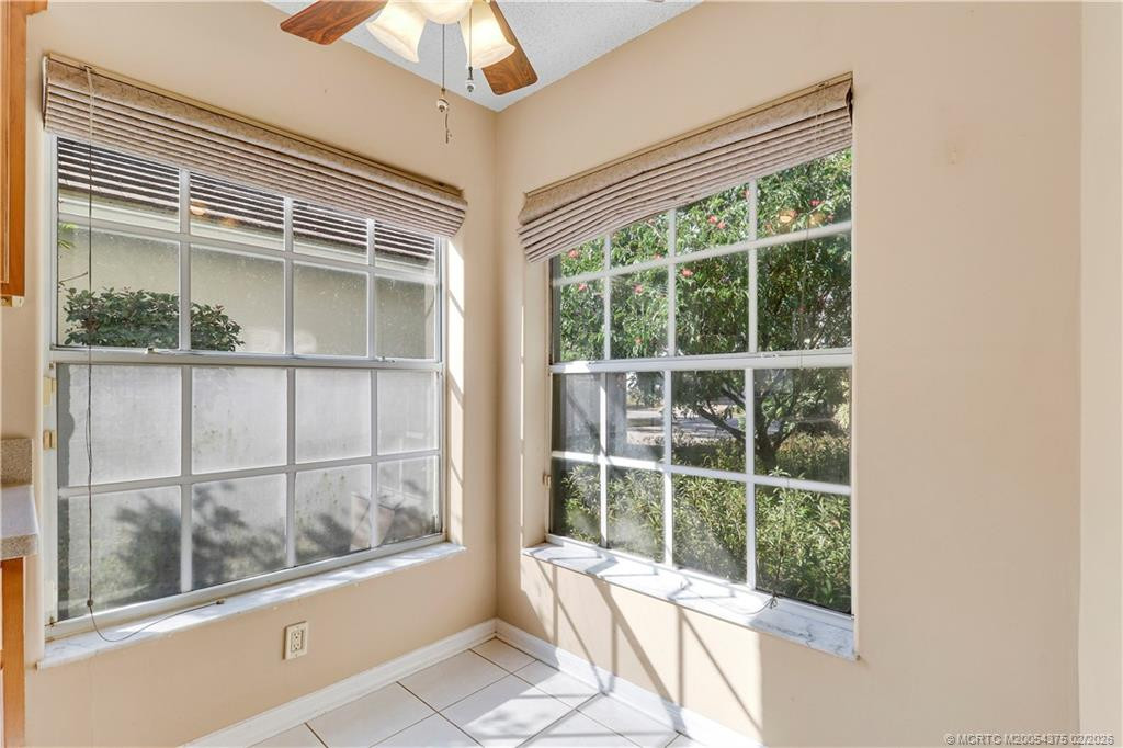 in the kitchen with natural lighting. at 2086 SW Olympic Club Terrace, Palm City