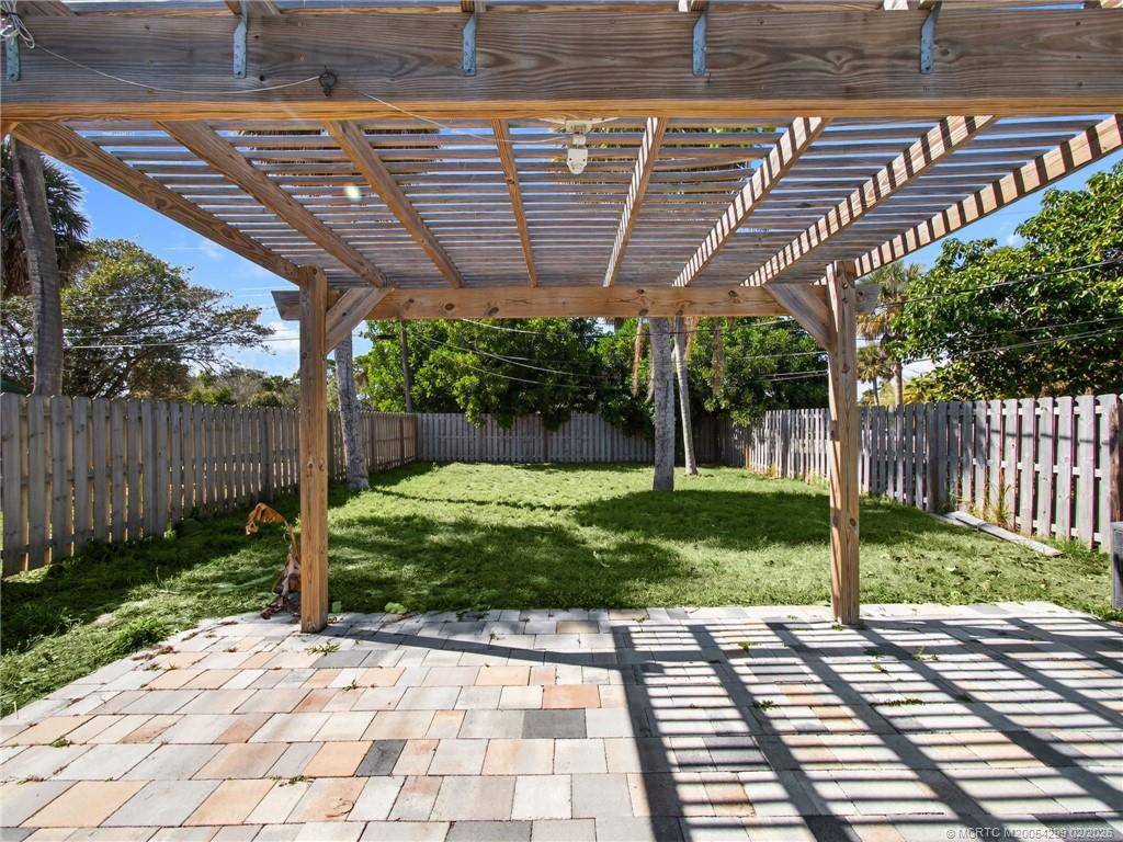 Paver patio with pergula.