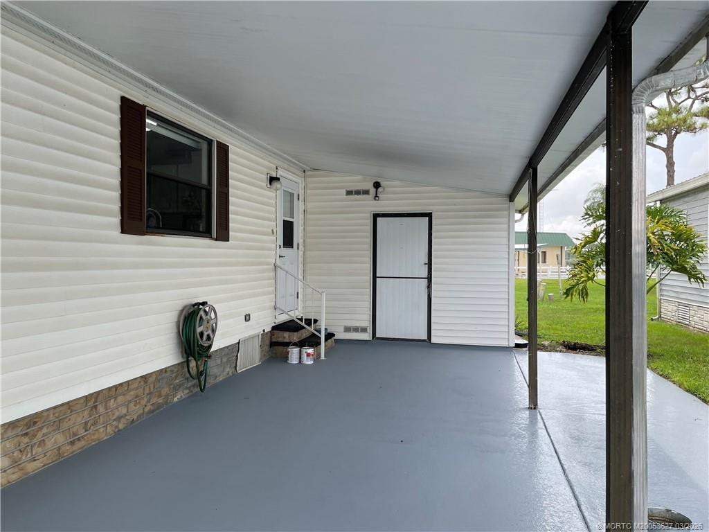 Extended driveway with storage shed