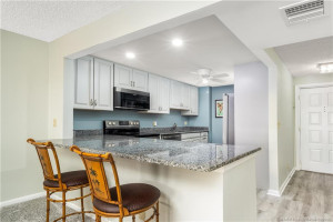 Wall removed merging kitchen & living space