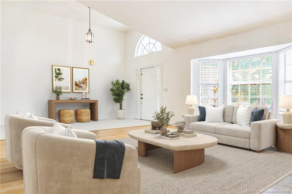 Virtually staged living room at 2773 SE Bluem Way, Port St. Lucie