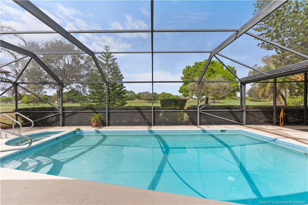 Pool and Golf Course view at 2802 SE Pine Valley Street, Port St. Lucie