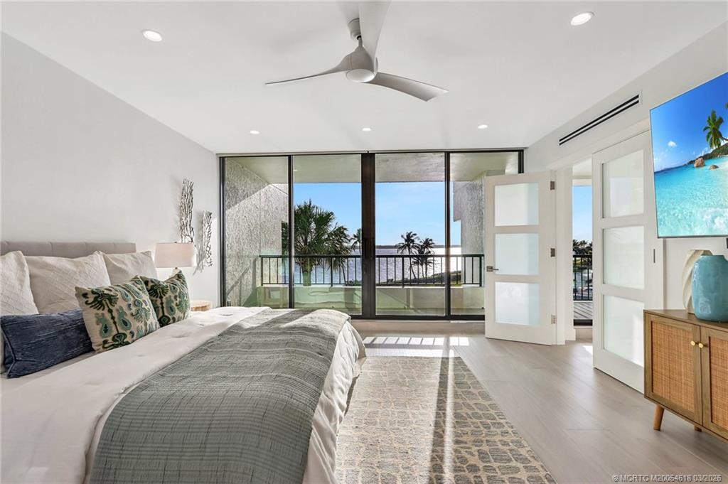 Sliding doors to the balcony from the owner's suite