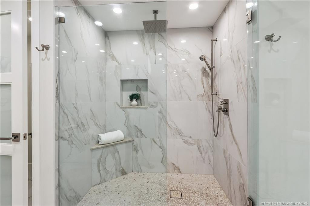 Beautiful walk-in shower in the owner's suite