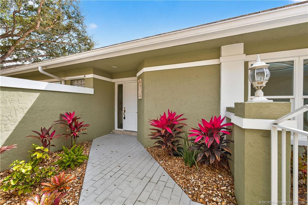 Front door, courtyard into house at 2467 SW Brookwood Lane, Palm City