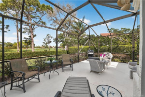 Photo for 13319 NW Maplewood Road, Palm City, FL 34990 - listing #M20054755 Screen Enclosed Patio overlooking #15 of River Ridge Course