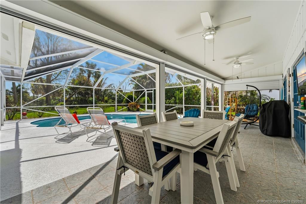 Covered patio with roll down hurricane shutters