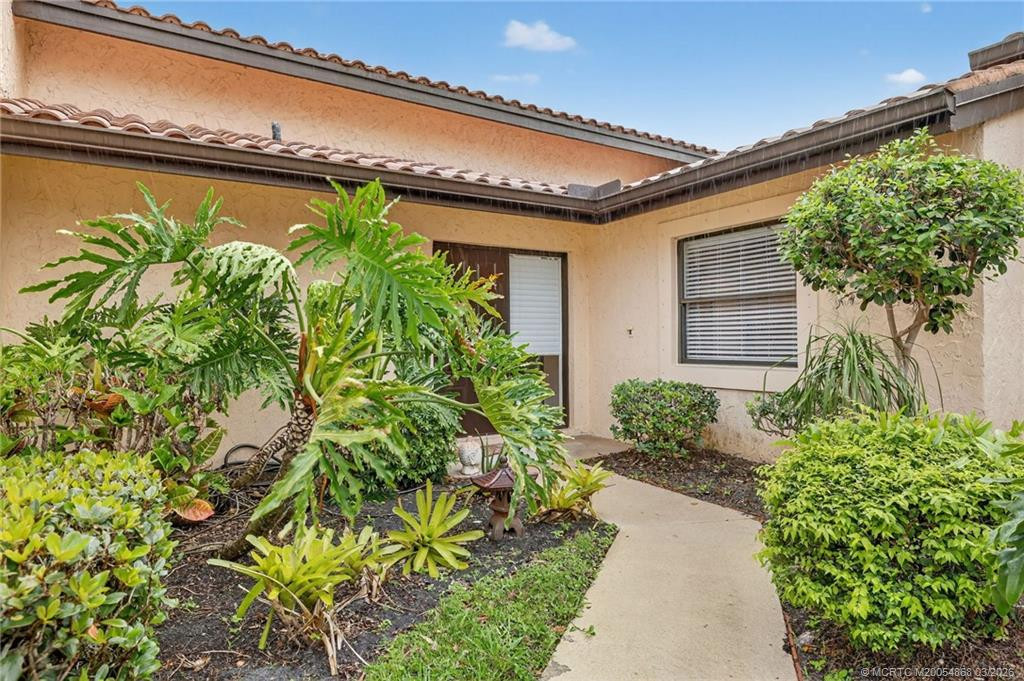 Photo 2 at 3584 SW Quail Meadow Trail E, Palm City