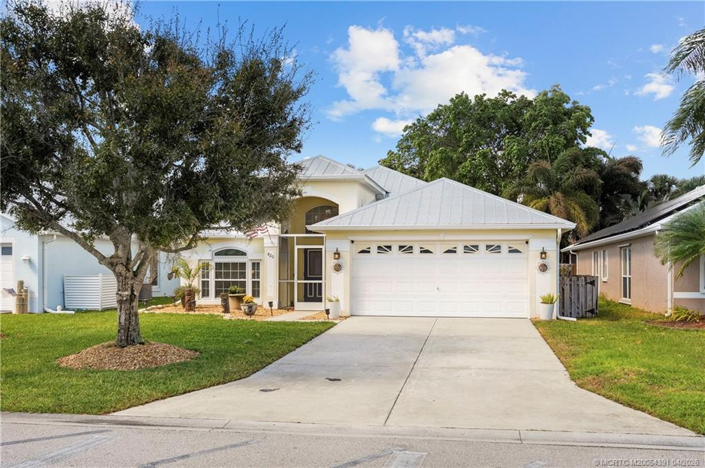 Front Exterior at 820 NW Waterlily Place, Jensen Beach