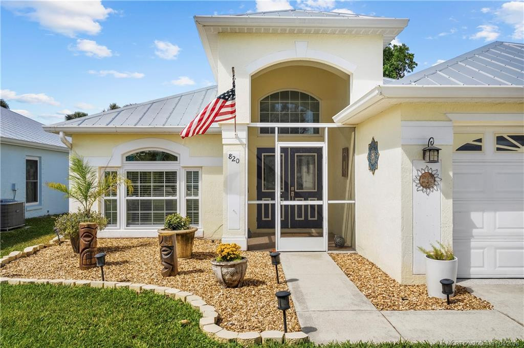 Front Exterior at 820 NW Waterlily Place, Jensen Beach