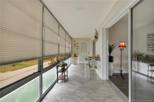 Enjoy a breeze from the balcony just off the living room.