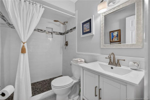 Updated en suite bathroom with beautiful tile work in the walk in shower.