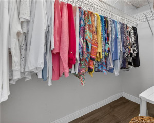 Spacious walk in closet, primary bedroom.