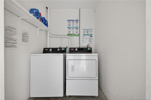 On floor community laundry room.