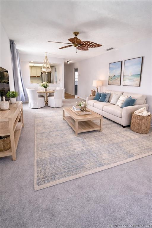 Staged Living/dining at 805 SE Central Parkway 16, Stuart
