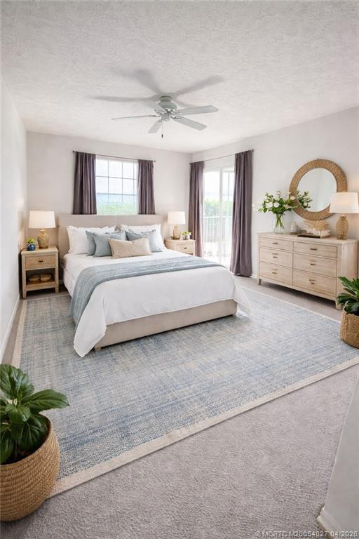 Staged Primary bedroom at 805 SE Central Parkway 16, Stuart