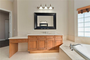 Primary bathroom vanity with makeup area