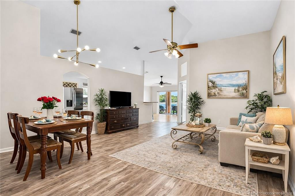 Family Room (some virtual staging) at 861 NW Waterlily Place, Jensen Beach