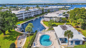 Enjoy true Florida living with three heated pools this pool is at the Clubhouse), waterfront lounging areas, and boat docks just steps away—perfect for boating, relaxing, and soaking in the coastal lifestyle