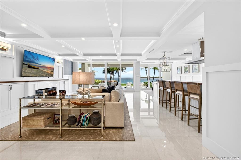 Gaze out to the St. Lucie Inlet and the Atlantic Ocean from your sofa