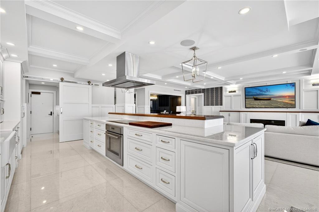 Thermador appliances, marble countertops, appliance garages. This kitchen is chef-ready!