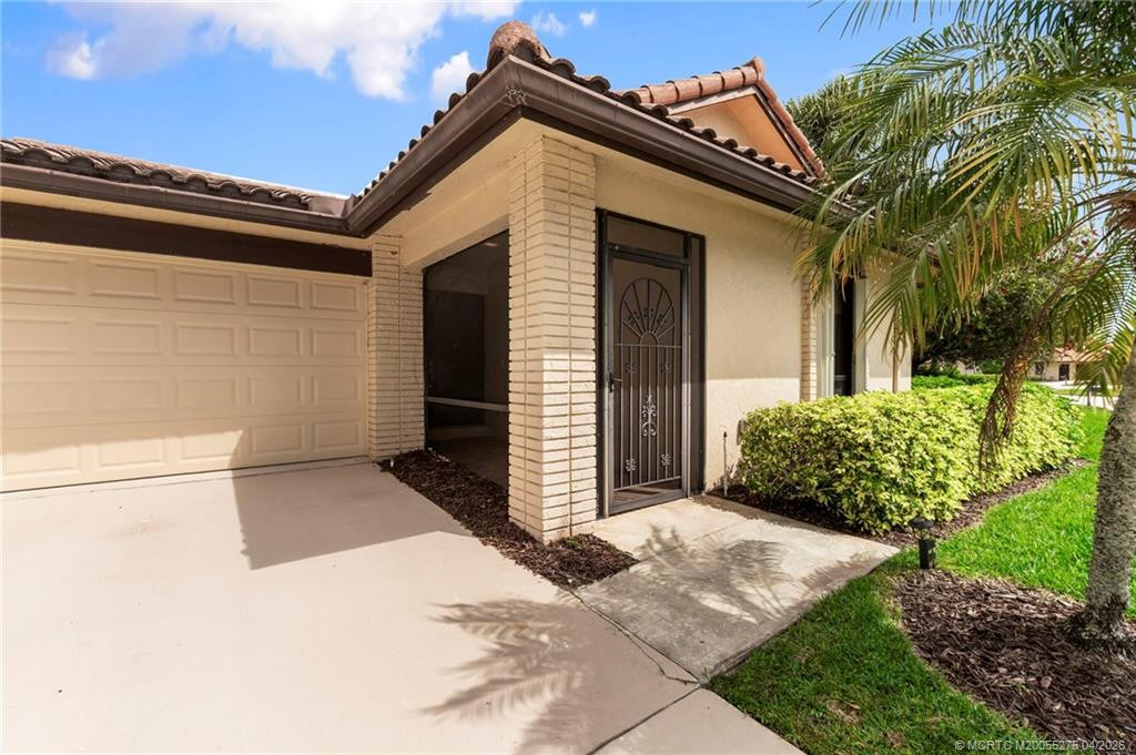 Entry porch. at 3281 SW Bobalink Way, Palm City