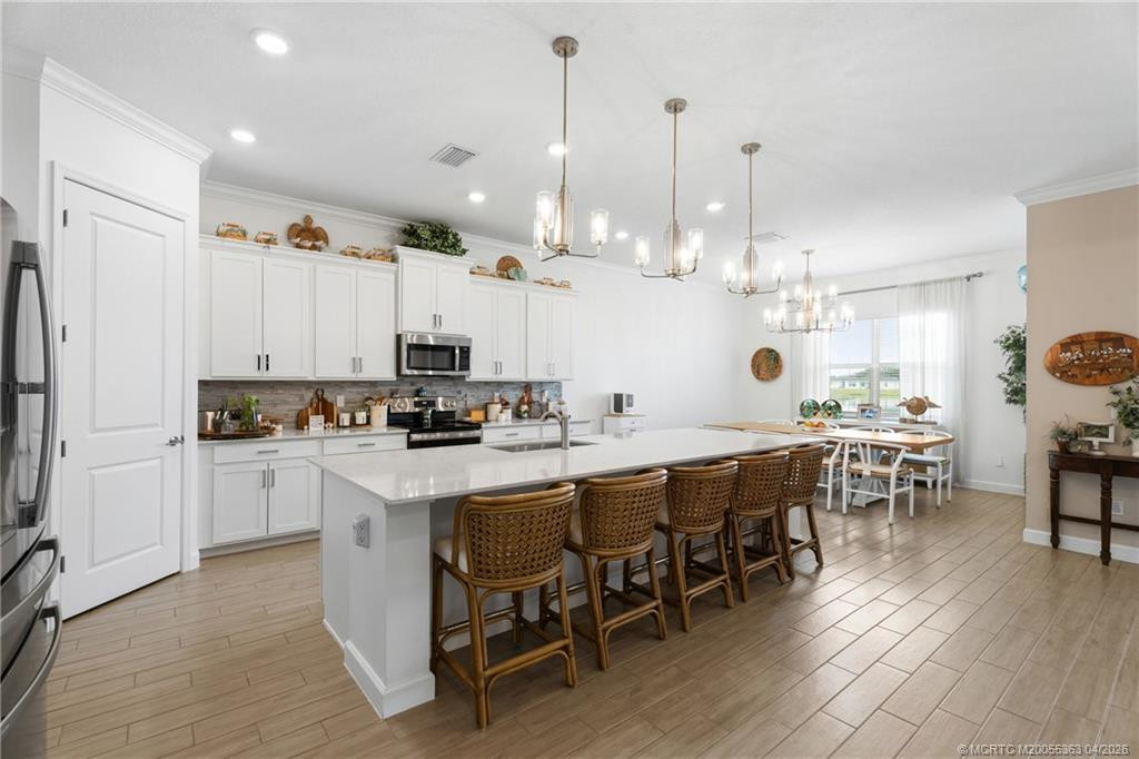 Photo 8 at 4855 Brookhaven Mnr SW, Vero Beach