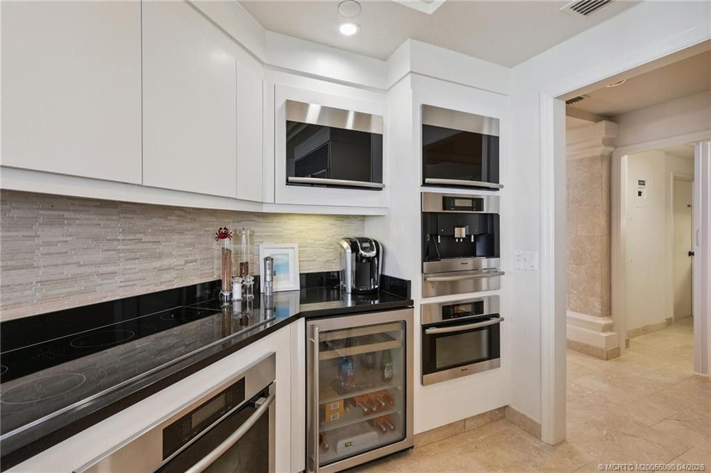 Stainless appliances, Miele cappucino maker and wall oven