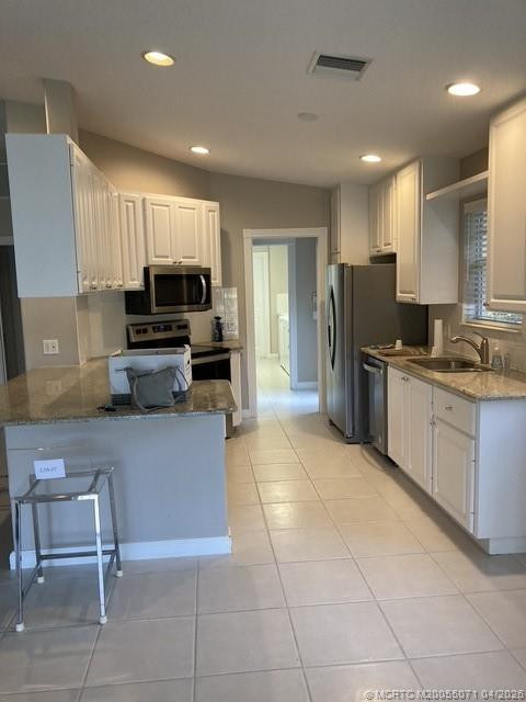 Generous Kitchen at 8952 SE Retreat Drive, Hobe Sound