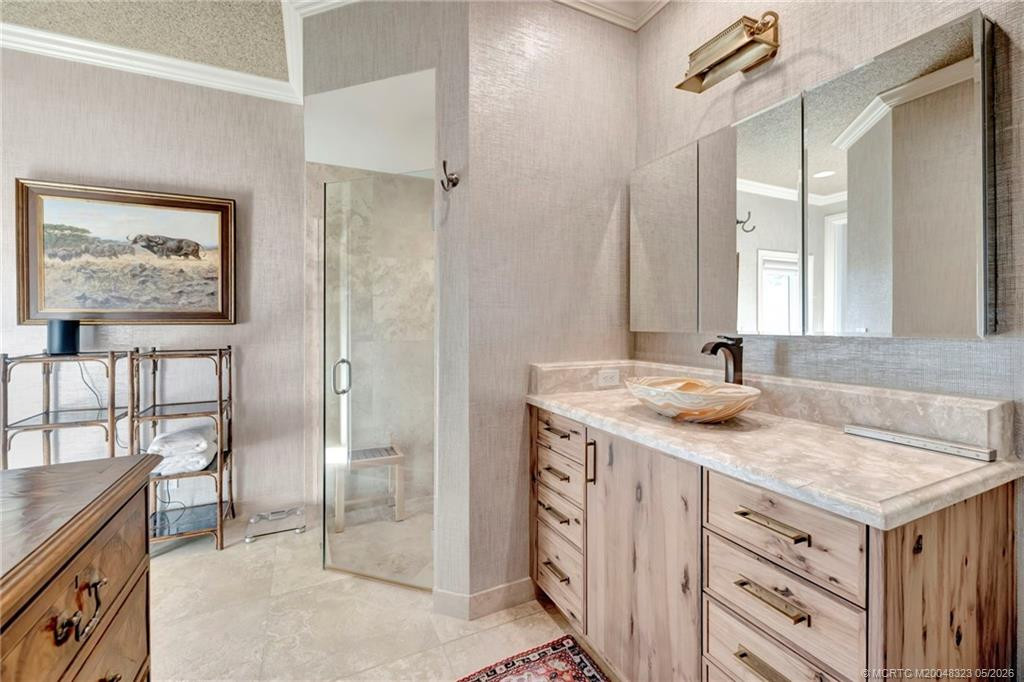 Primary bath #2 provides access to the patio, pool and spa.