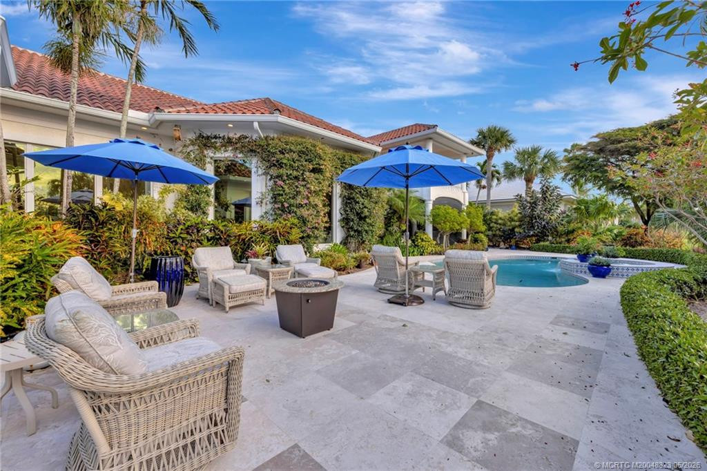 Spacious patio surrounded by tropical gardens