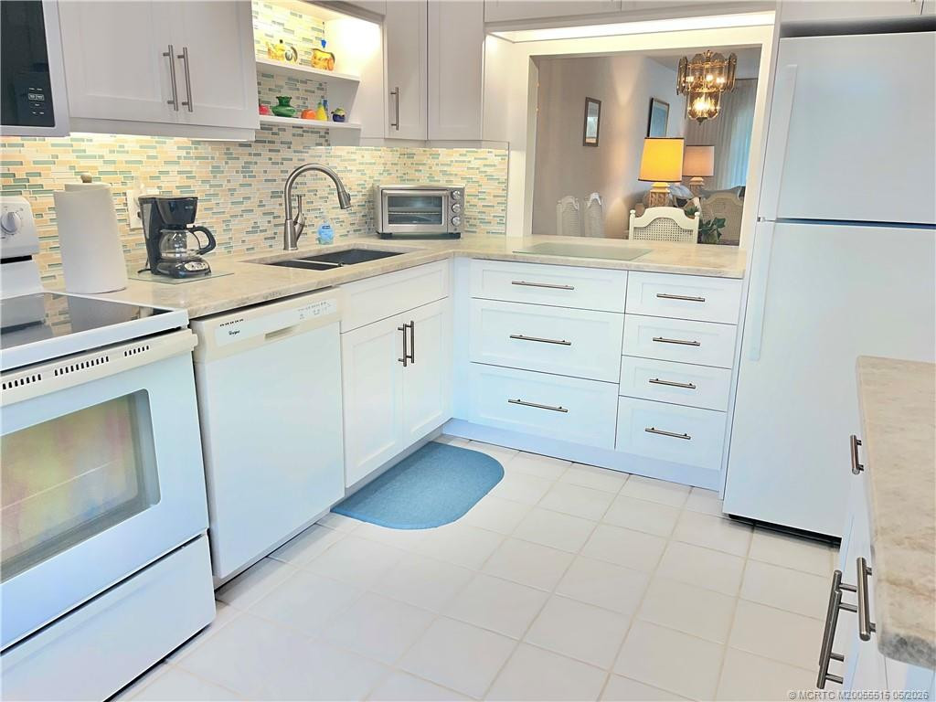 Photo 7 at 1858 SW Palm City Road 203, Stuart