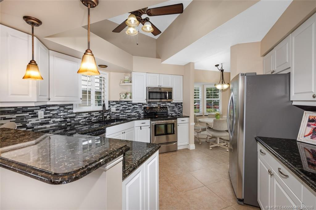 Photo 7 at 2438 SW Foxpoint Trail, Palm City
