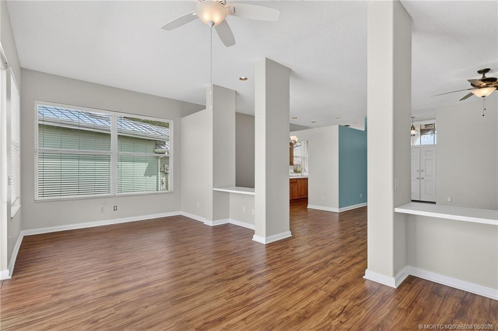 Florida Room with dining area and kitchen and living room to the right