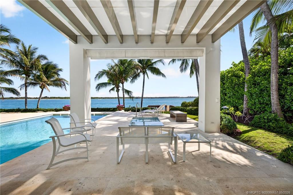 Relax and refresh on this covered patio