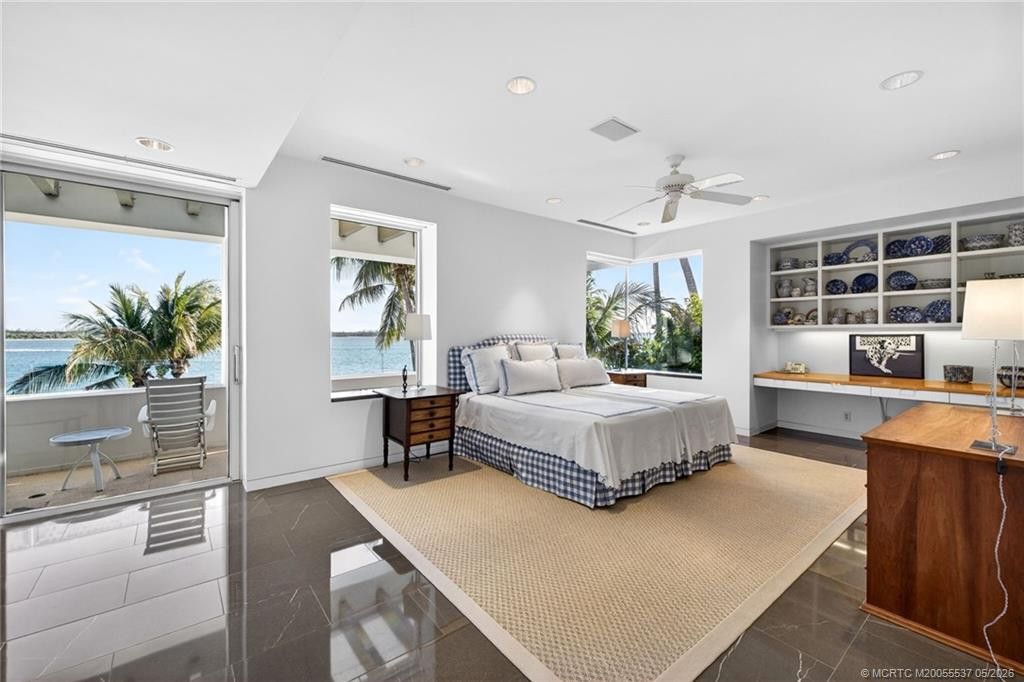Upper guest room with sitting area, balcony
