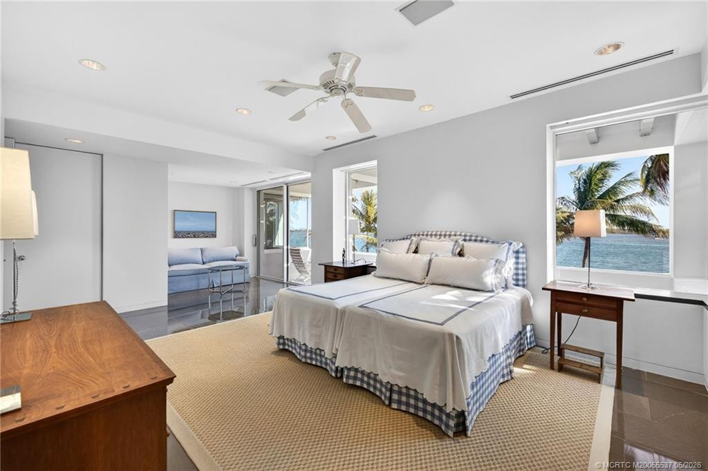 Upper guest room with sitting area, balcony
