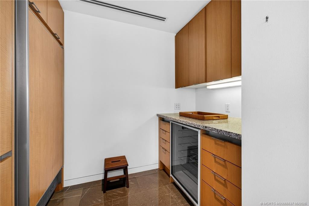 Freezer, wine cooler, extra storage off the kitchen